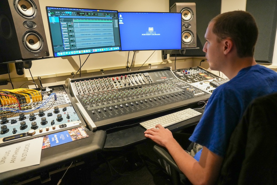 Student working on a music recording project.