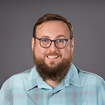 A headshot of Timothy Clasby.