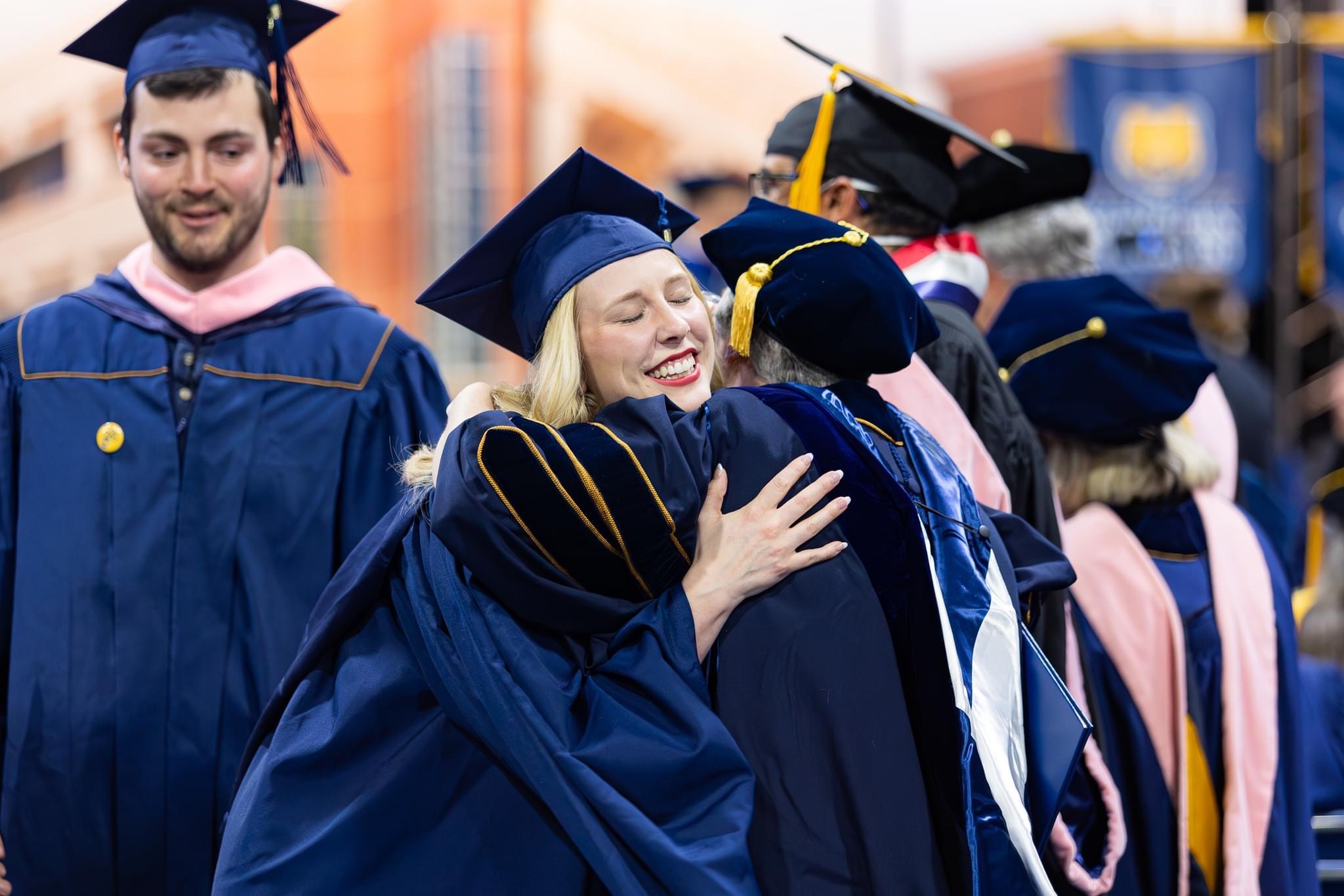 Student, Conner Williams with Dr. Carissa Reddick at graduation.