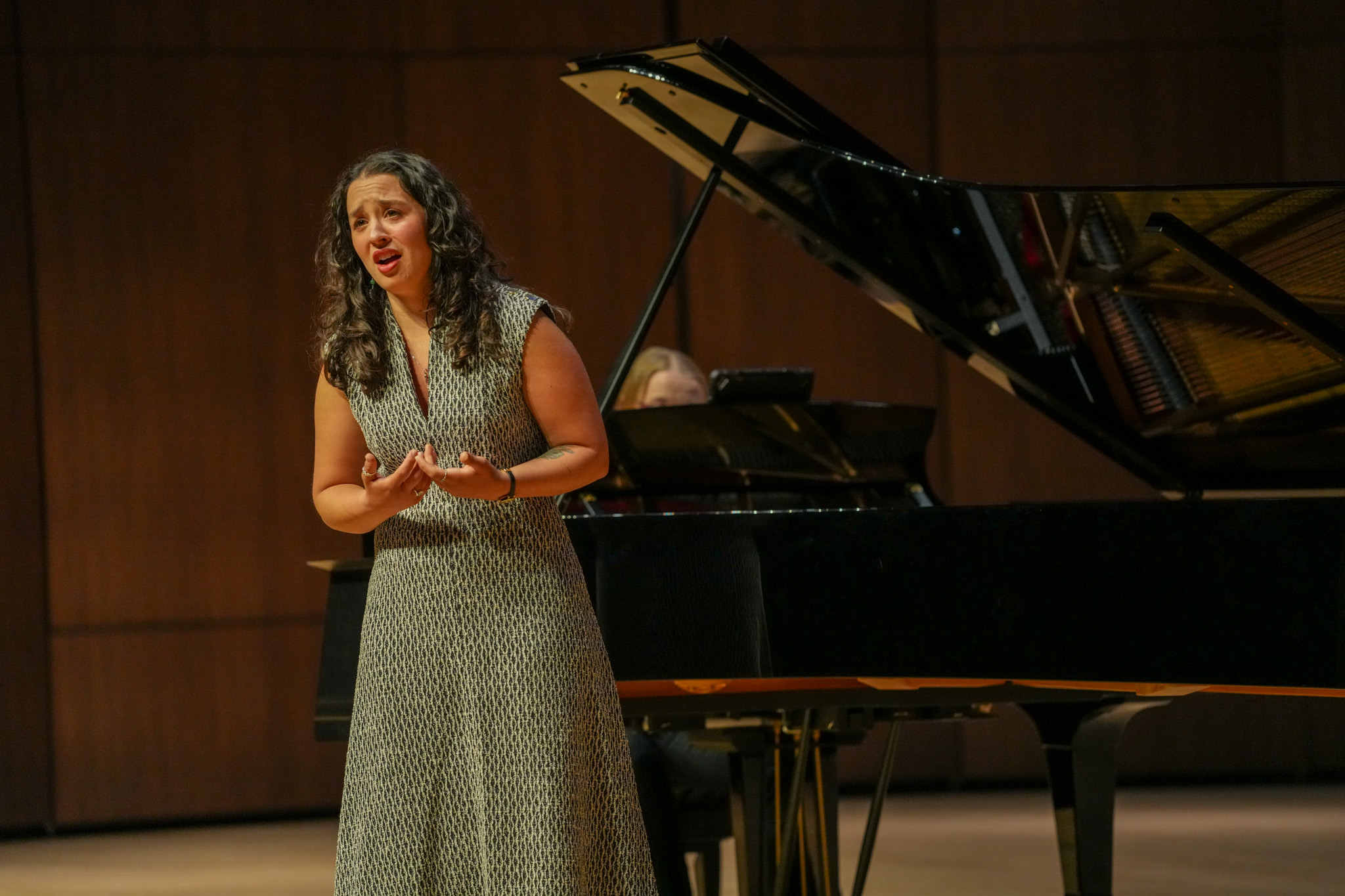 Student Colleen Martinez performing voice.