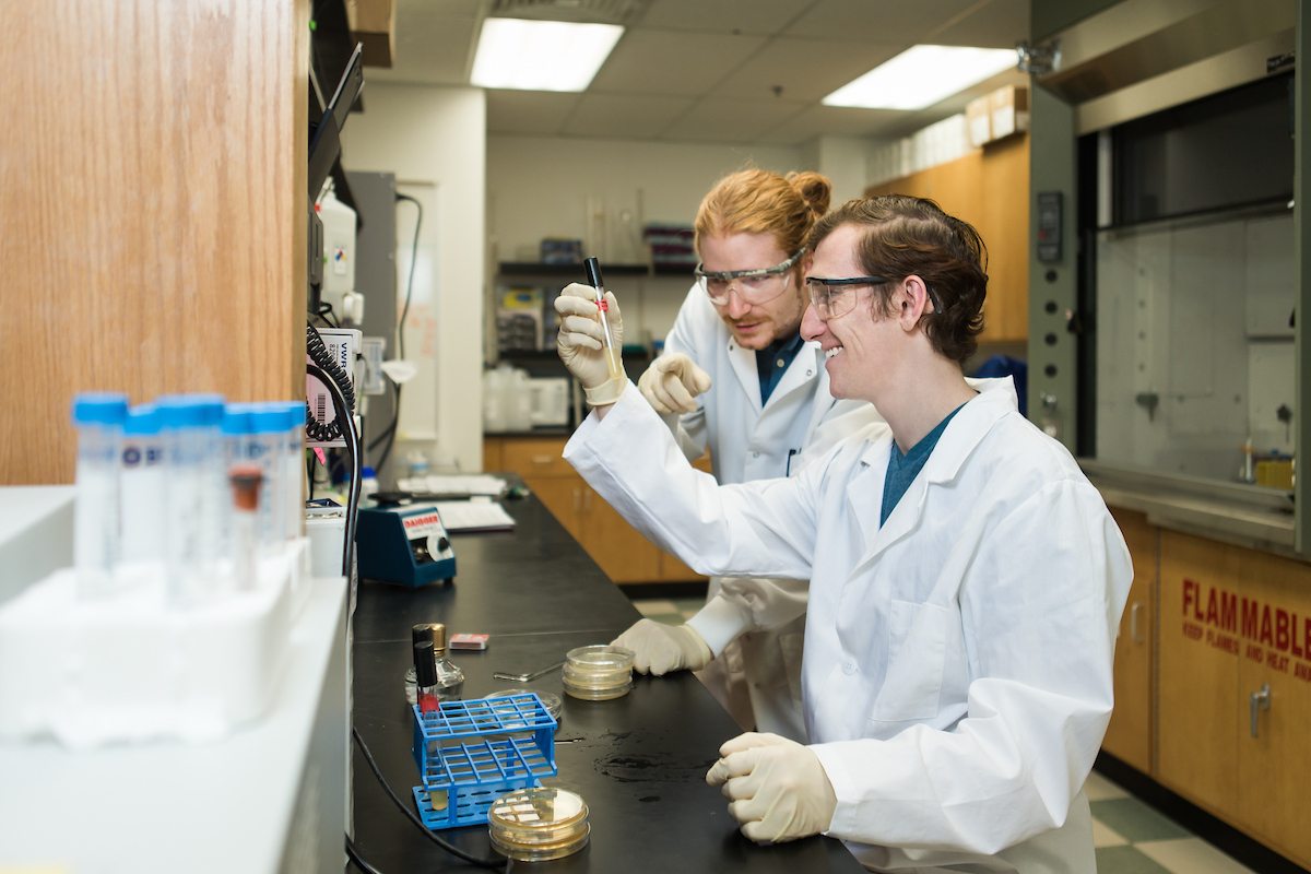 student working in biology lab.