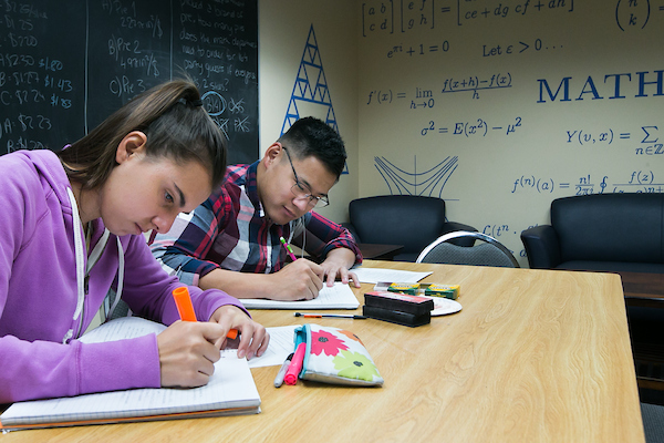 Students studying in a math classroom
