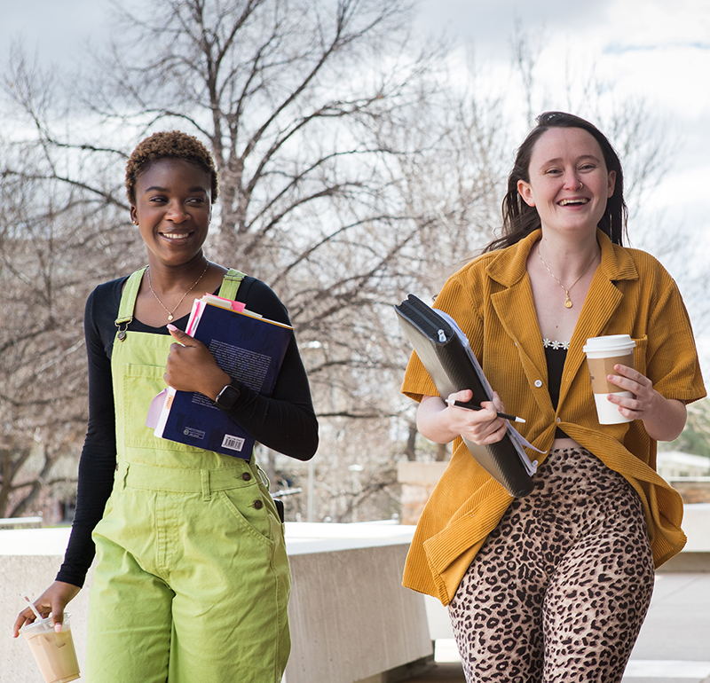 Two female students laughing