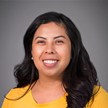 A headshot of Marcela Swain.