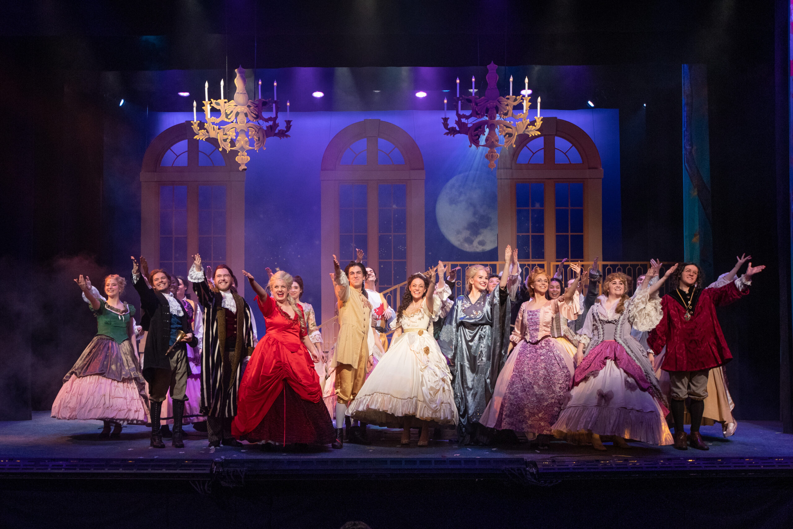 A stage full of performers in the musical Cinderella in Langworthy Theatre.