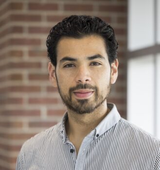 Headshot of David Mesquitic.