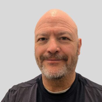 A portrait of Thom Dunn.