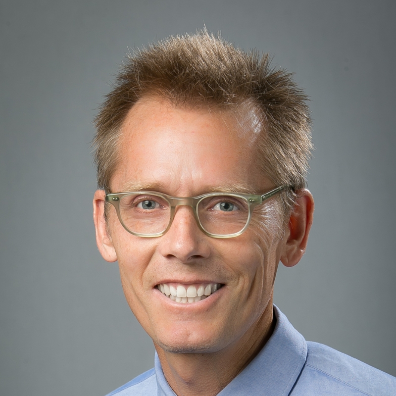 A portrait of James Erekson.