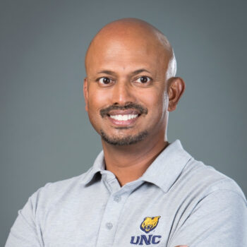 A portrait of Anand Raj.