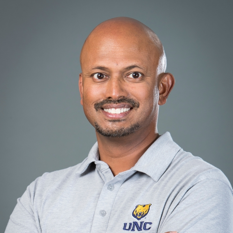 A portrait of Anand Raj.