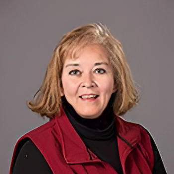 A headshot of Deb Miller