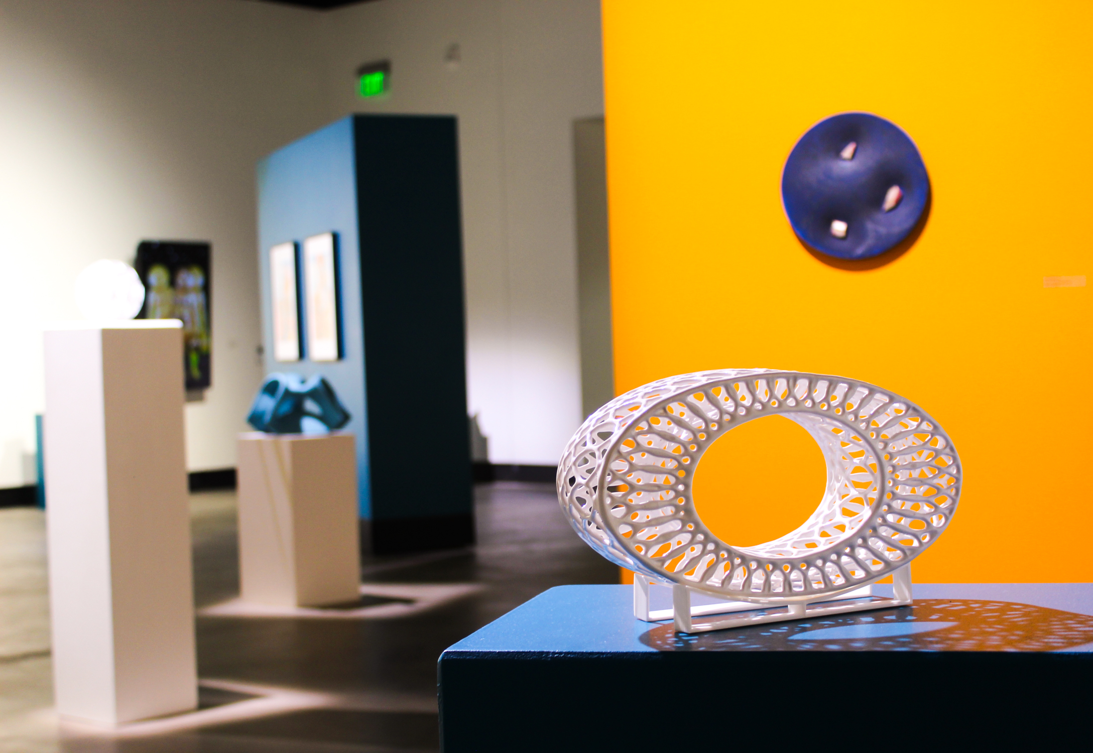 A ceramics piece in the Satellite: New Realities in Clay art exhibition in Campus Commons Gallery.