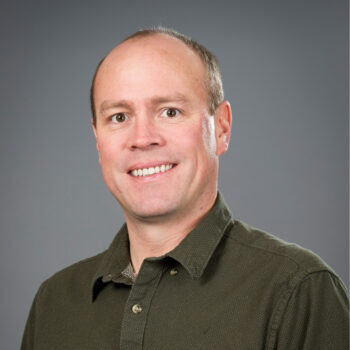 A portrait of Andy Riley.