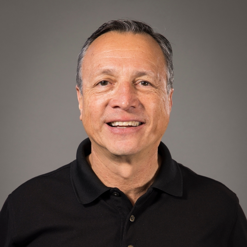 A portrait of Aldo Romero.