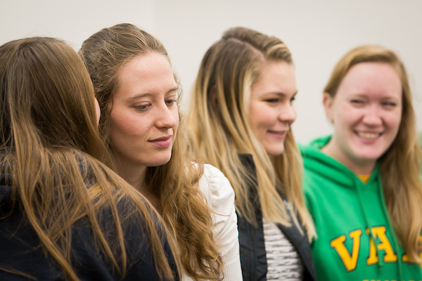 Four students in a Spanish class