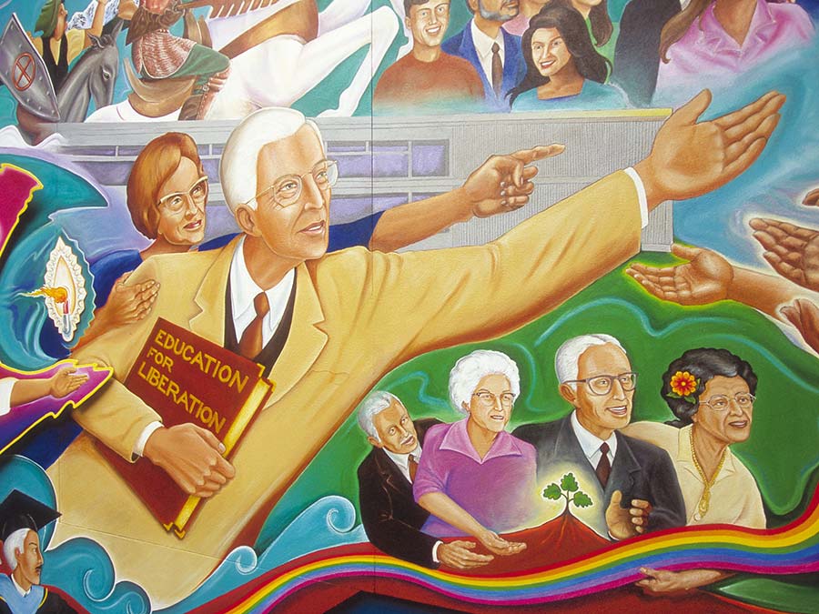 A mural painted by Leo Tanguma depicting the life and times of Dr. Candelaria.