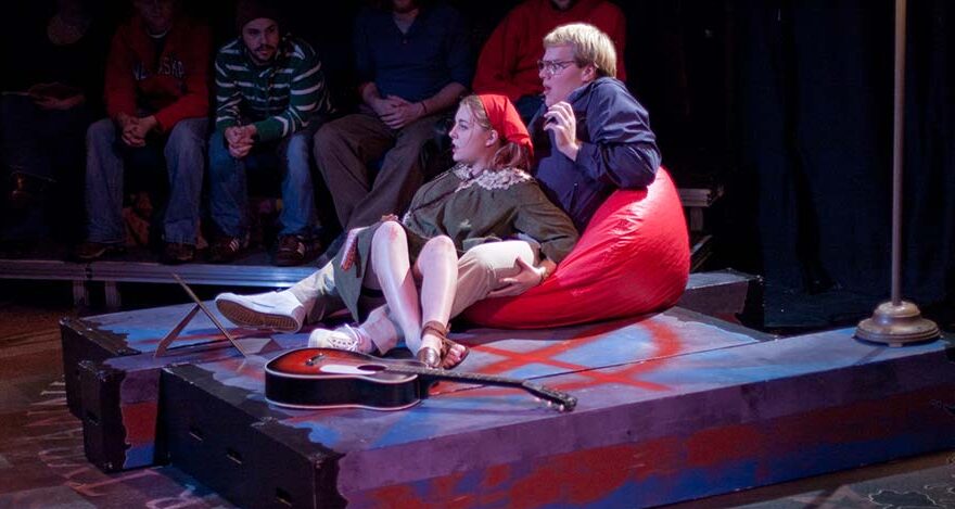 Two UNC theatre students participate in a Black Box play in Norton Theatre.