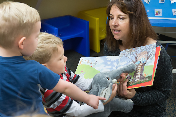 UNC Speech-Language Pathology clinic staff working with children during therapy sessions