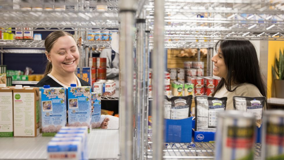 Two students selecting their items at Bear Pantry.