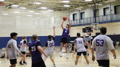 group of students playing basketball