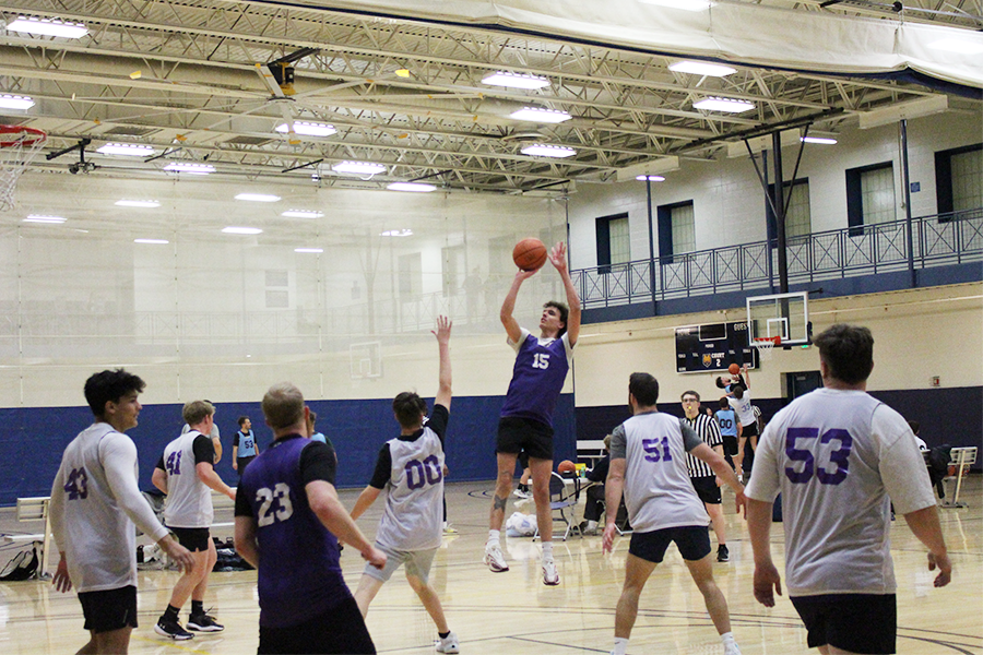 group of students playing basketball