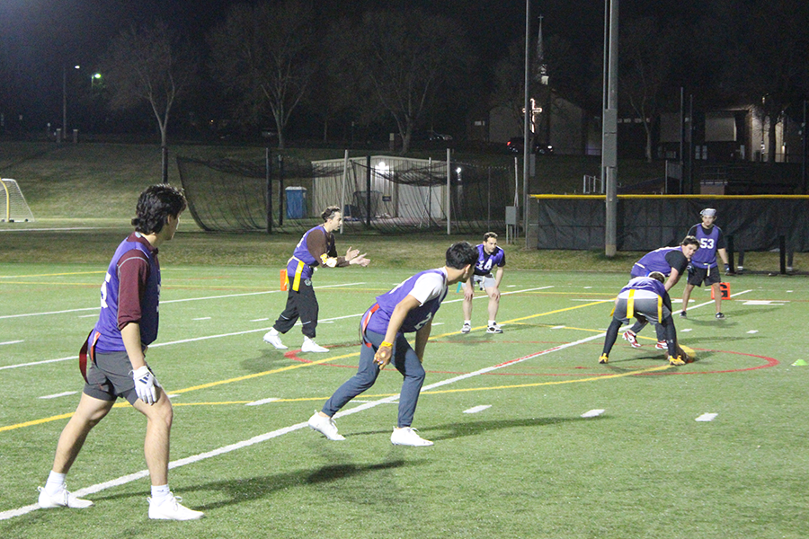 group of students playing flag football