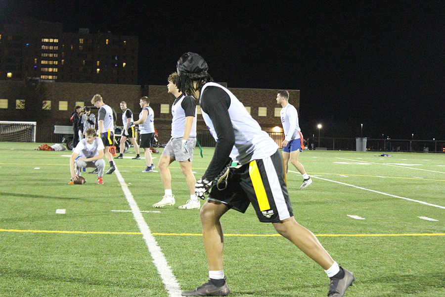 group of students playing flag football