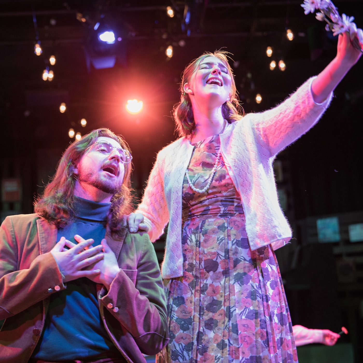 2 students singing in Little Theatre of the Rockies 2024 summer show, Almost Heaven.