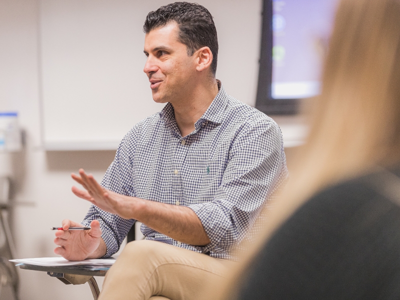 professor theoklitos karipidis teaching a psychology class