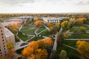 An aerial of UNC's campus during the fall.