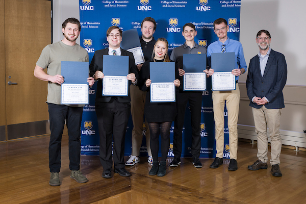 Mason Palagyi, Dale Bodine, Conlan Moe, Sophia Tavanello, Jaeden Nelson, and Anders Wolle pictured with Charles Soukup at the HSS Convocation 2025