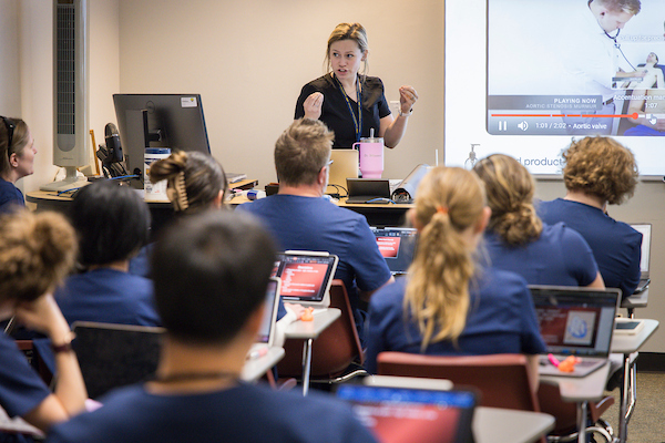 Professor lecturing class on medical practice