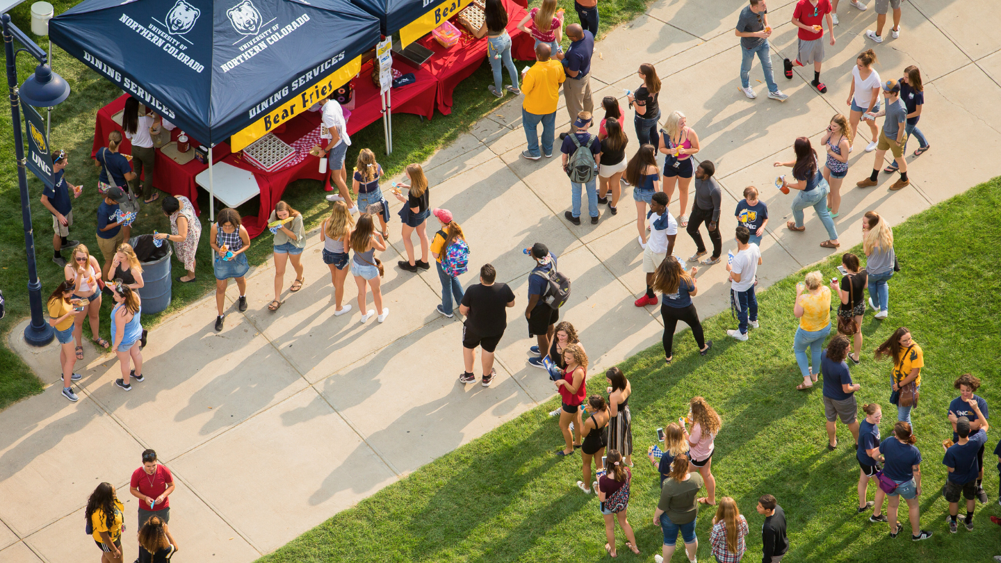 An aerial photo of students walking across campus.