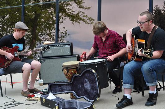 Student group performing music for World Language Day