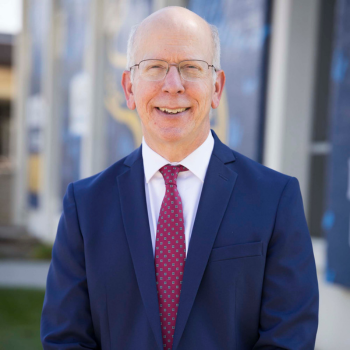 Headshot of John Hancock