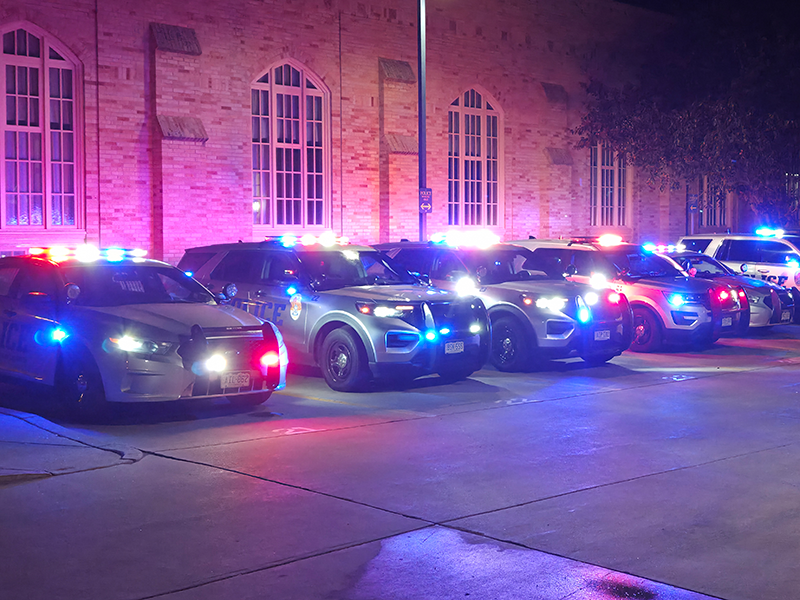 Police cars with lights on