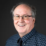 Headshot of Denny McCorkle