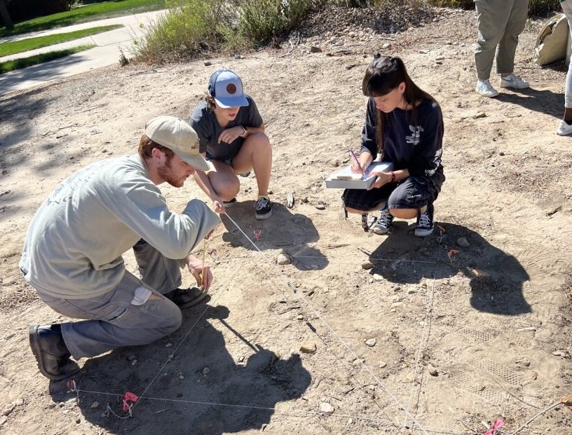 Three students in ANT 320 Mock Dig