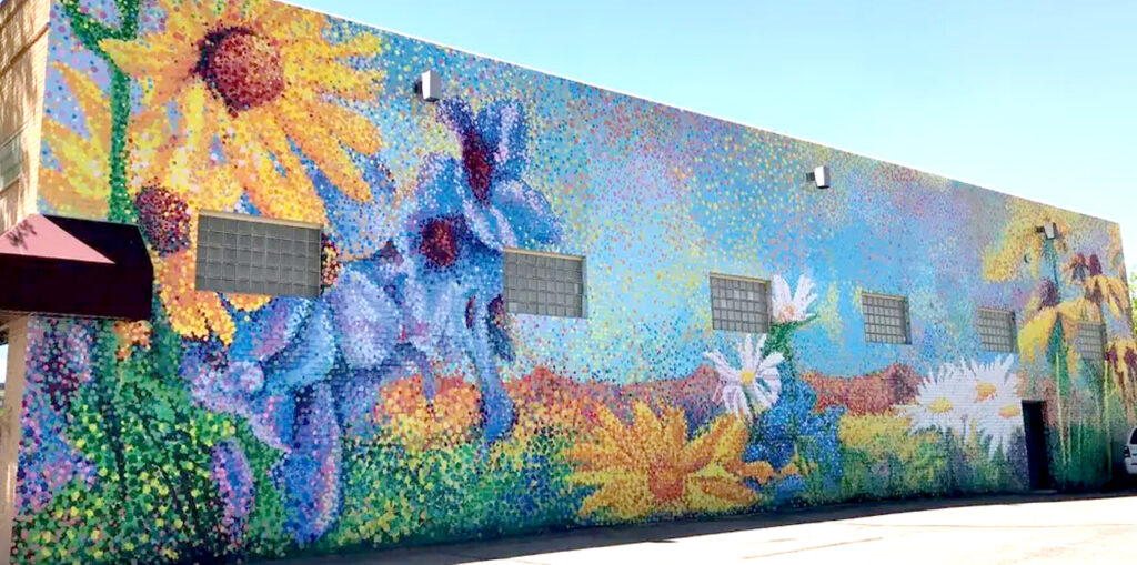 A colorful mural of a field of flowers.