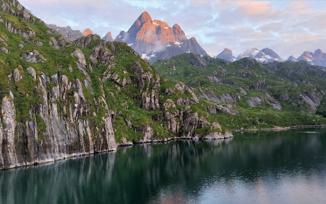A rocky, mountainous coastline.