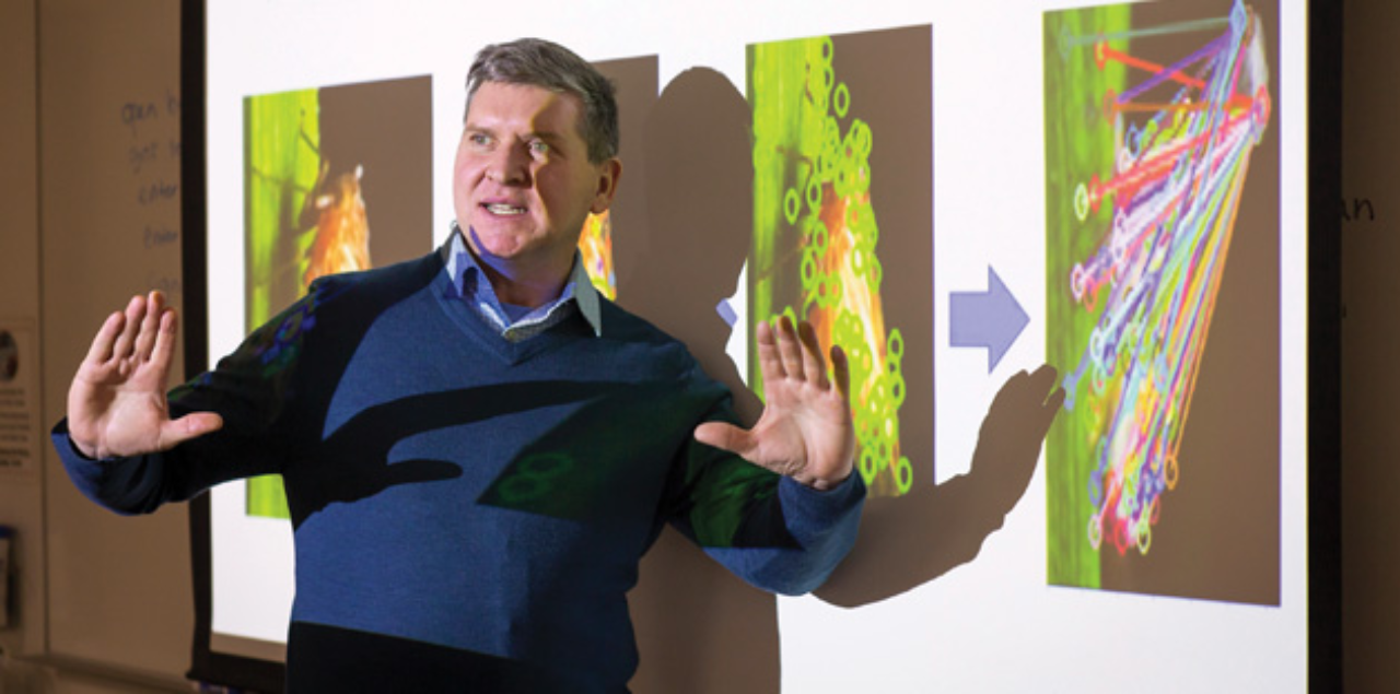 Christopher Harris, Ph.D., Professor of Computer Science, presenting on AI