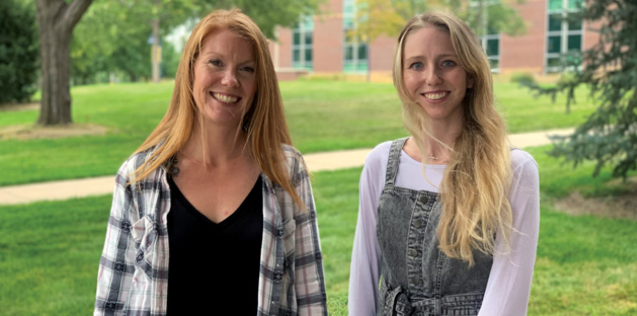 Ashley Coburn and Breanna King standing next to each other on UNC's campus.