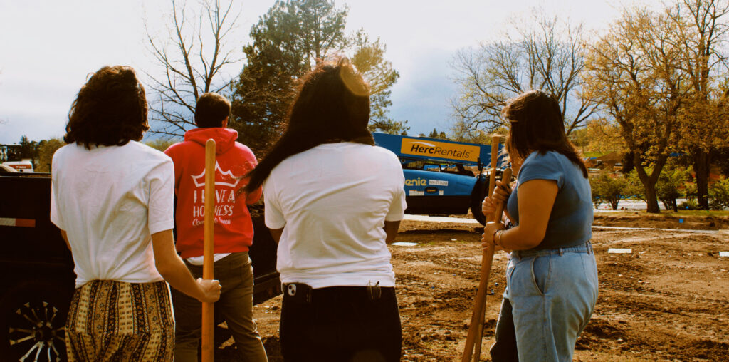 The back of students on a site outside