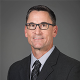 Headshot of Cory Pierce