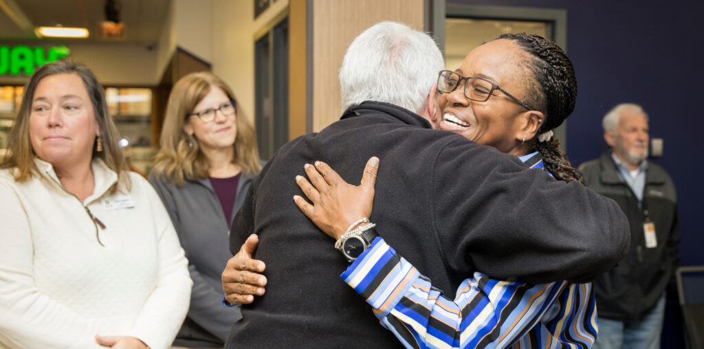 Two people embracing in a hug