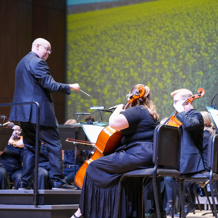 Doctoral student Sergio Castro Medina conducting the UNC Symphony Orchestra.