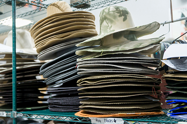 A bunch of hats stacked on top of each other