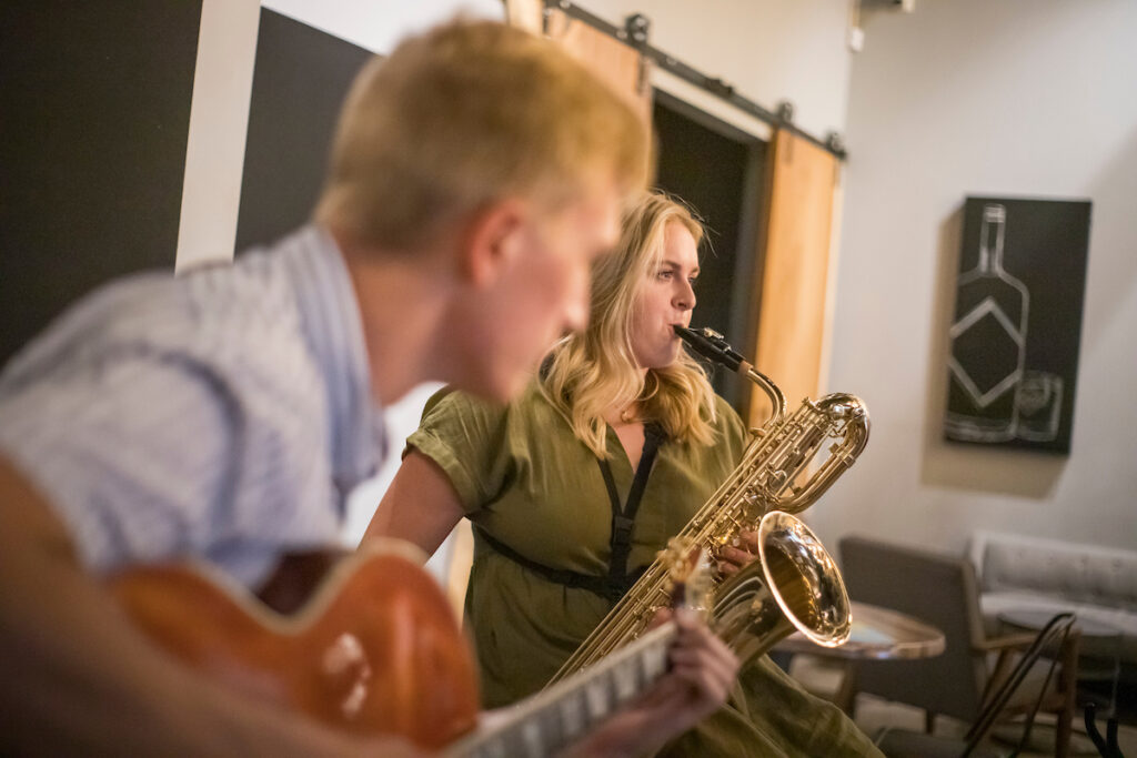 a woman playing the saxophone