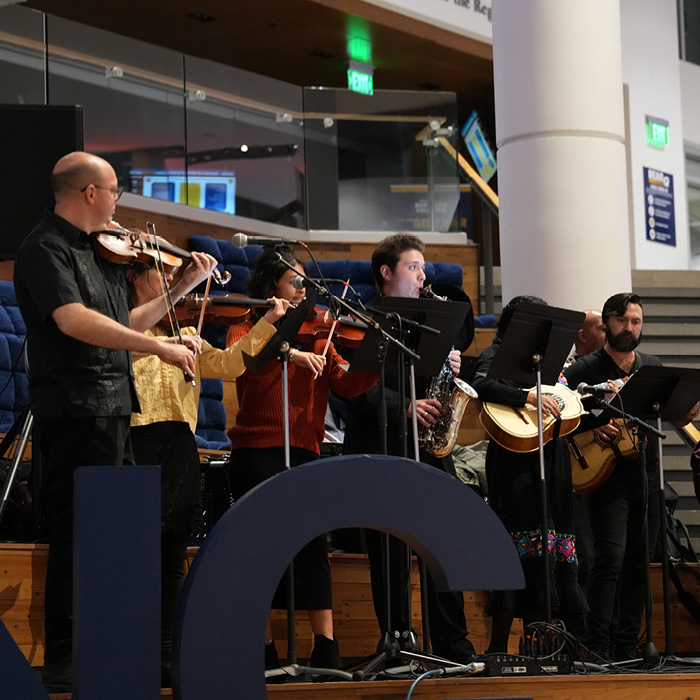 Latin Beat Ensemble playing on the Social Stairs in Campus Commons.