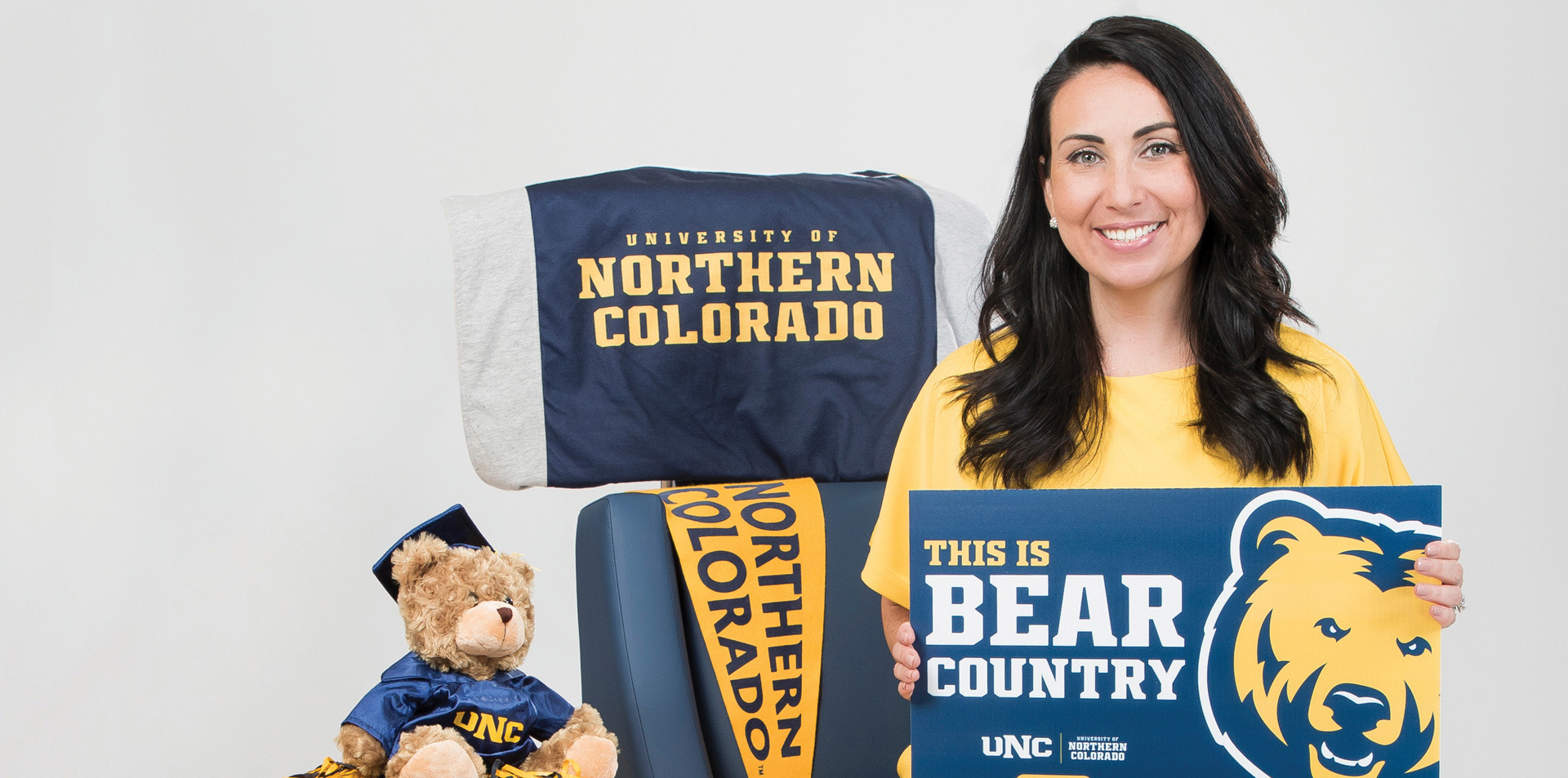 Lyndsey Crum surrounded by UNC fan gear